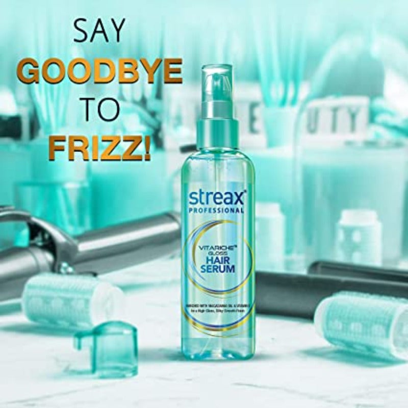 Hair serum bottle with text 'Say Goodbye to Frizz!' on a blurred background of hair care products.